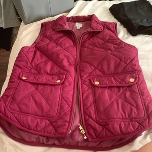 Pink J Crew puffer vest with gold hardware